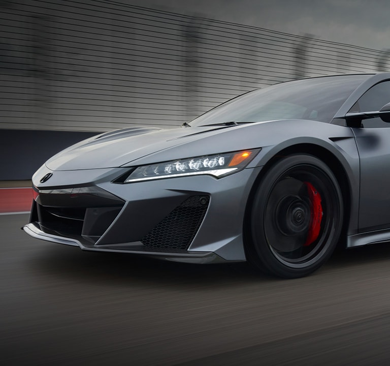 Acura 2022 NSX Type S in Gotham Gray Matte 7/8 front view driving